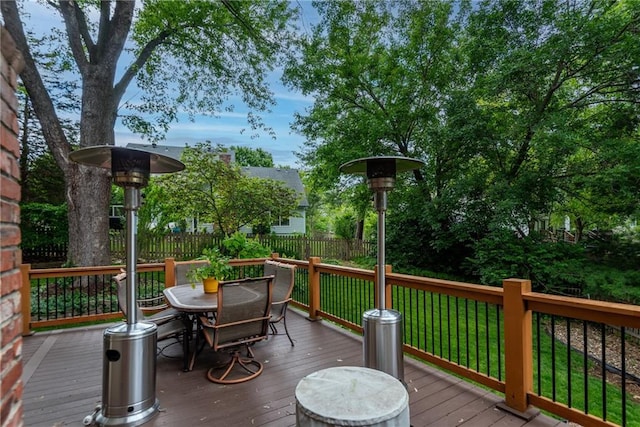 13008 Fontana St, Leawood, KS 66209 - wooden terrace with outdoor dining area