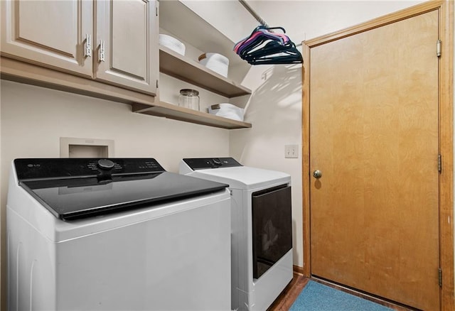 13008 Fontana St, Leawood, KS 66209 - laundry room with cabinet space, washer and dryer, and wood finished floors