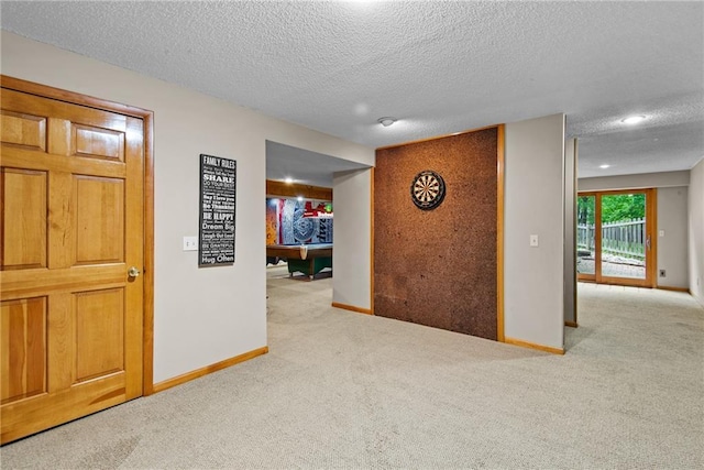13008 Fontana St, Leawood, KS 66209 - hall featuring carpet flooring and a textured ceiling