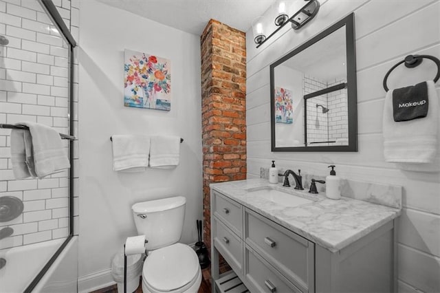 5741 Hadley St, Merriam, KS 66202 - bathroom featuring vanity, toilet, and shower / bath combination
