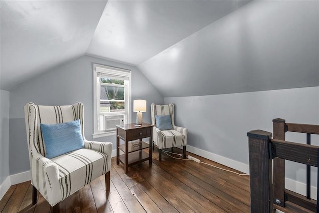 5741 Hadley St, Merriam, KS 66202 - living area with hardwood / wood-style floors, vaulted ceiling, and baseboards