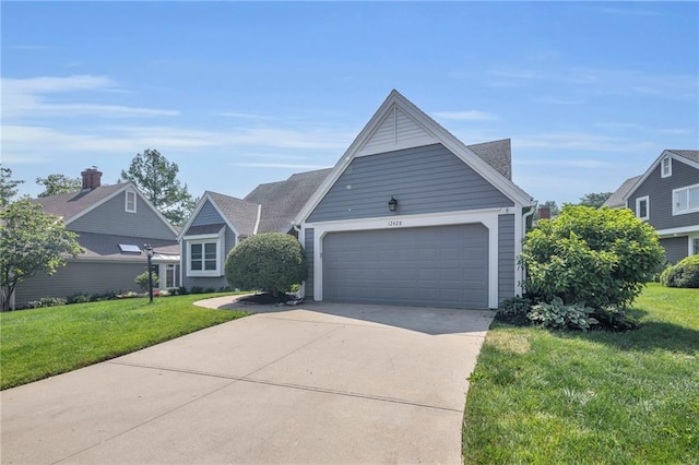 12428 Cambridge Cir, Leawood, KS 66209 - view of front of house with driveway, a front lawn, and a garage