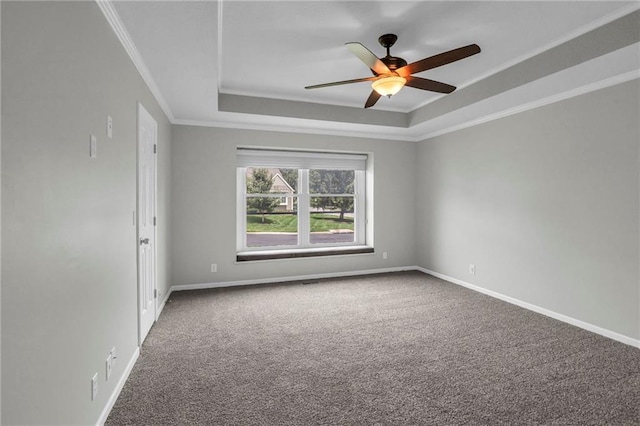 12428 Cambridge Cir, Leawood, KS 66209 - carpeted empty room featuring a raised ceiling, ceiling fan, crown molding, and baseboards