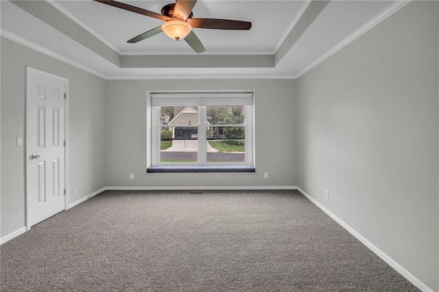 12428 Cambridge Cir, Leawood, KS 66209 - carpeted empty room with a raised ceiling, ceiling fan, crown molding, and baseboards