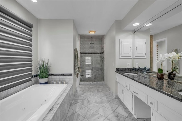 12428 Cambridge Cir, Leawood, KS 66209 - full bath featuring a stall shower, a jetted tub, double vanity, marble look tiles, and recessed lighting