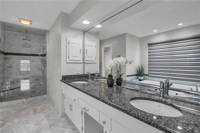 12428 Cambridge Cir, Leawood, KS 66209 - bathroom with a stall shower, double vanity, marble finish floors, baseboards, and recessed lighting