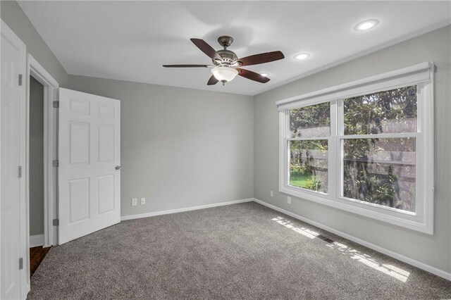 12428 Cambridge Cir, Leawood, KS 66209 - empty room with baseboards, carpet flooring, ceiling fan, and recessed lighting