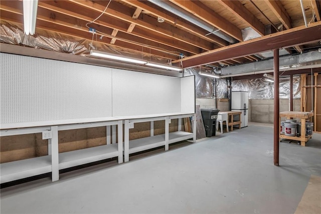 12428 Cambridge Cir, Leawood, KS 66209 - unfinished below grade area featuring a workshop area