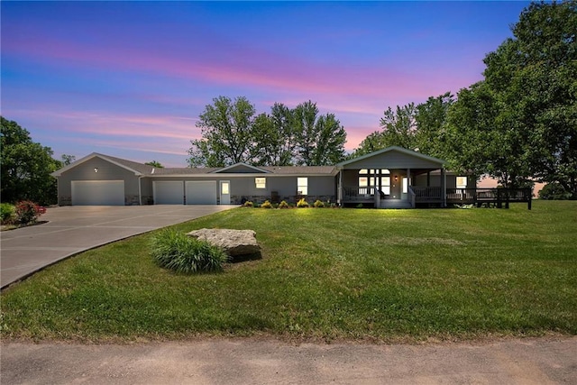 3906 Oo Hwy, Odessa, MO 64076 - single story home featuring concrete driveway, an attached garage, a front lawn, and covered porch