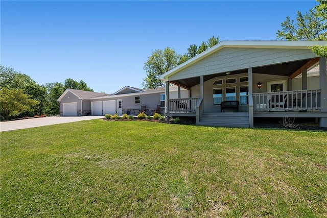 3906 Oo Hwy, Odessa, MO 64076 - view of front of home with a porch, driveway, a front lawn, and a garage