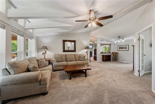 3906 Oo Hwy, Odessa, MO 64076 - carpeted living room with lofted ceiling, ceiling fan, and baseboards
