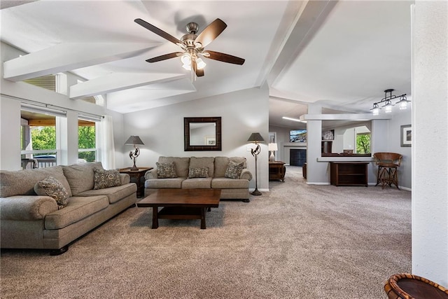 3906 Oo Hwy, Odessa, MO 64076 - carpeted living room with a fireplace, plenty of natural light, ceiling fan, and baseboards