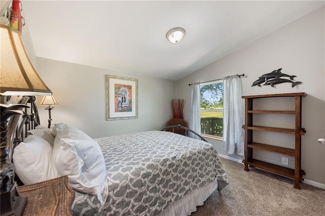 3906 Oo Hwy, Odessa, MO 64076 - carpeted bedroom featuring vaulted ceiling and baseboards