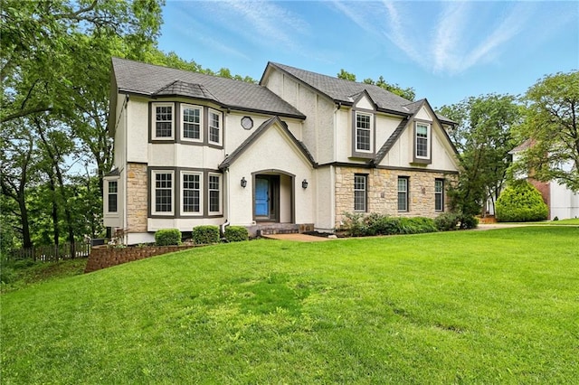 12844 Granada Ln, Leawood, KS 66209 - english style home featuring stone siding and stucco siding