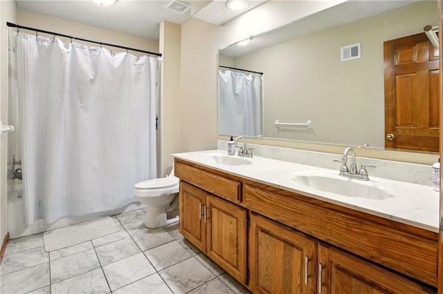 12844 Granada Ln, Leawood, KS 66209 - bathroom with marble look tiles, double vanity, shower / bath combo, and a textured ceiling