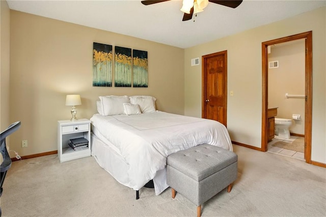 12844 Granada Ln, Leawood, KS 66209 - bedroom featuring light carpet, ensuite bathroom, and ceiling fan