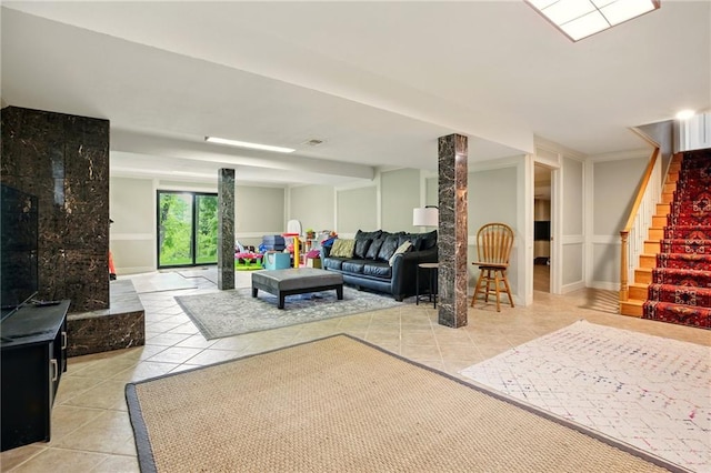 12844 Granada Ln, Leawood, KS 66209 - living area featuring light tile patterned floors and stairs
