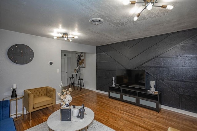 3802 Roanoke Rd, Kansas City, MO 64111 - living area featuring wood finished floors and baseboards