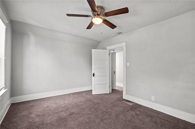 509 Pottawatomie St, Leavenworth, KS 66048 - spare room featuring dark carpet and ceiling fan