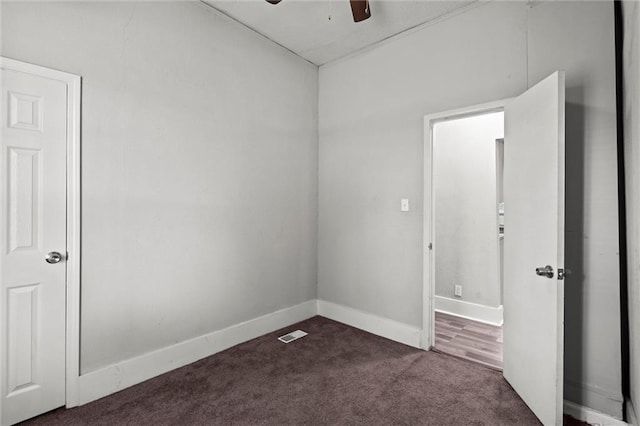 509 Pottawatomie St, Leavenworth, KS 66048 - spare room featuring dark carpet and a ceiling fan