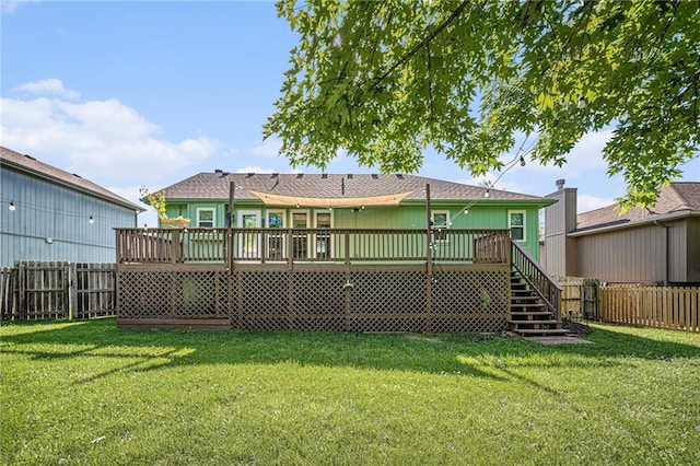 212 Hampton Dr, Smithville, MO 64089 - back of house featuring a fenced backyard, a deck, and stairs