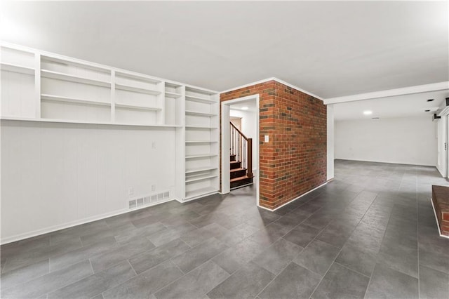 804 5th St, Baldwin City, KS 66006 - unfurnished living room with stairway and built in features