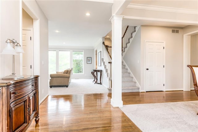 13310 W 129th St, Overland Park, KS 66213 - entrance foyer featuring stairs, baseboards, wood finished floors, recessed lighting, and crown molding