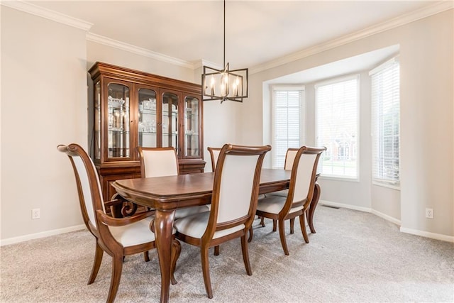 13310 W 129th St, Overland Park, KS 66213 - dining area featuring a chandelier, ornamental molding, light carpet, and baseboards