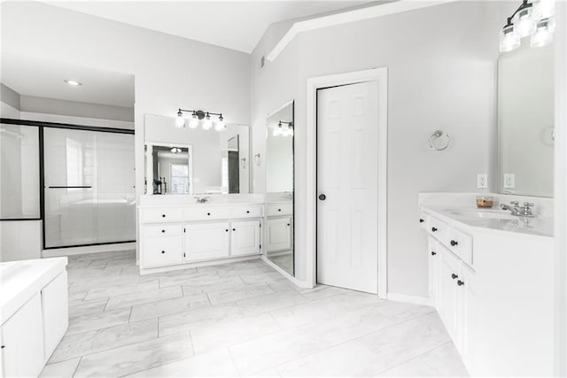 13310 W 129th St, Overland Park, KS 66213 - bathroom featuring a shower stall, two vanities, and marble finish flooring