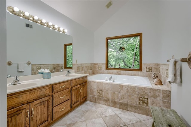5317 NW Bluff Way, Parkville, MO 64152 - bathroom with a bath, double vanity, and high vaulted ceiling