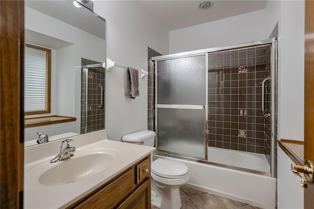 5317 NW Bluff Way, Parkville, MO 64152 - full bath with toilet, tile patterned flooring, vanity, and bath / shower combo with glass door