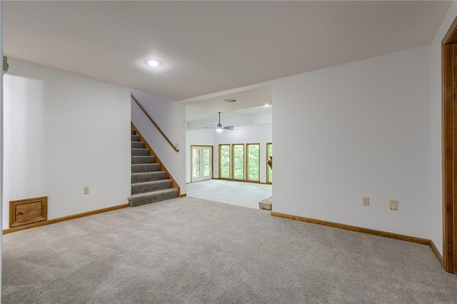 5317 NW Bluff Way, Parkville, MO 64152 - empty room with stairway, carpet flooring, baseboards, a ceiling fan, and recessed lighting