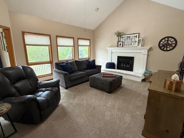5604 Pleasant Ave, Saint Joseph, MO 64503 - carpeted living room featuring a fireplace and high vaulted ceiling