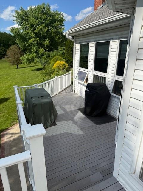5604 Pleasant Ave, Saint Joseph, MO 64503 - deck with area for grilling and a lawn