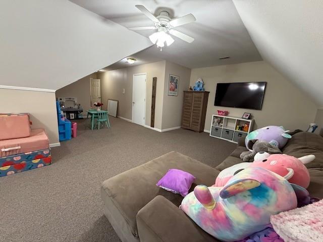 5604 Pleasant Ave, Saint Joseph, MO 64503 - living area featuring vaulted ceiling, carpet flooring, ceiling fan, and baseboards