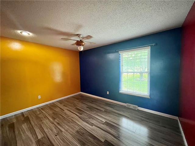 1 N Vine View St, Platte City, MO 64079 - unfurnished room with a ceiling fan, a textured ceiling, wood finished floors, and baseboards