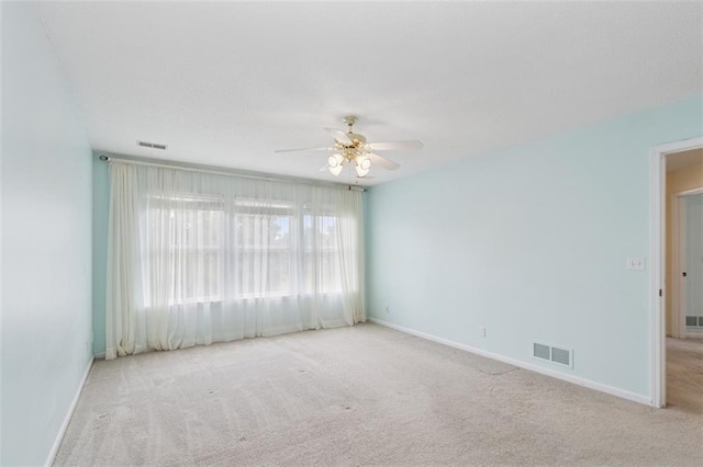 15050 W 145th St, Olathe, KS 66062 - empty room featuring a ceiling fan, carpet flooring, and baseboards