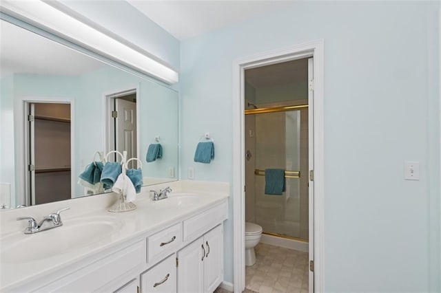 15050 W 145th St, Olathe, KS 66062 - bathroom with toilet, a stall shower, and double vanity