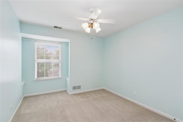 15050 W 145th St, Olathe, KS 66062 - empty room with carpet flooring, baseboards, and a ceiling fan
