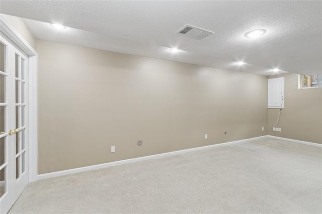 15050 W 145th St, Olathe, KS 66062 - spare room featuring light colored carpet, a textured ceiling, baseboards, and recessed lighting