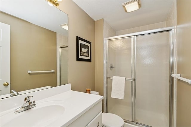 15050 W 145th St, Olathe, KS 66062 - bathroom featuring toilet, vanity, and a shower stall