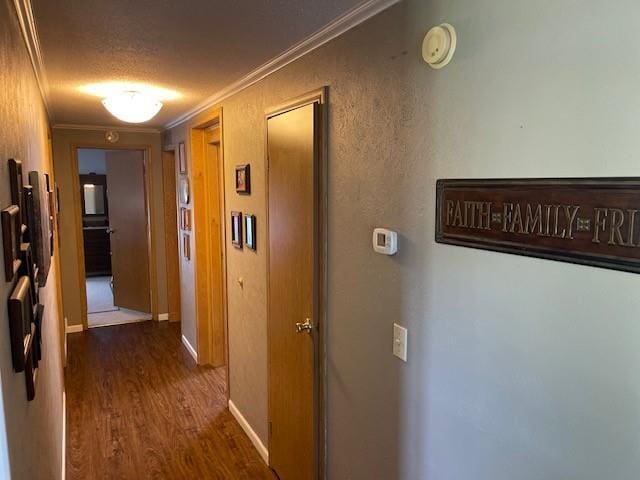 4691 New Hampshire Rd, Bronson, KS 66716 - corridor with crown molding, dark wood-style floors, a textured ceiling, and baseboards