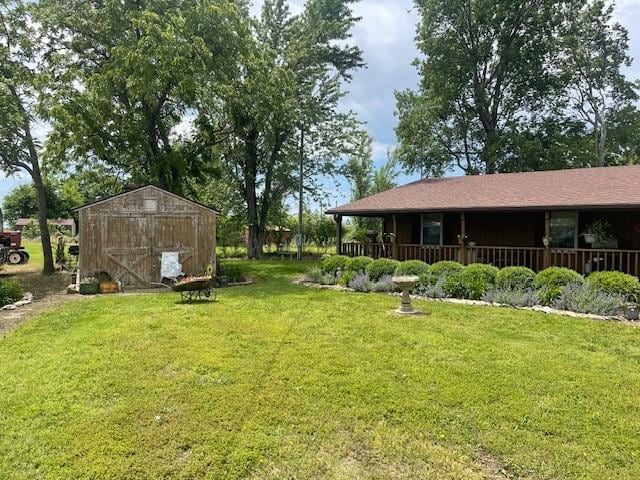 4691 New Hampshire Rd, Bronson, KS 66716 - view of green lawn featuring covered porch