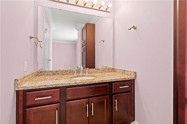 700 E 8th St Unit 11T, Kansas City, MO 64106 - bathroom with vanity and crown molding