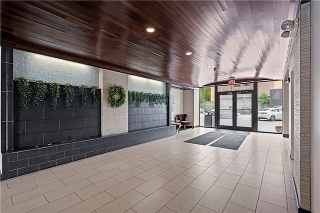700 E 8th St Unit 11T, Kansas City, MO 64106 - community lobby with wood ceiling, expansive windows, and recessed lighting