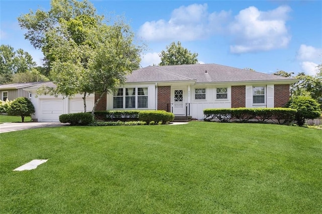 5407 W 64th Ter, Prairie Village, KS 66208 - single story home with a front yard, brick siding, and driveway