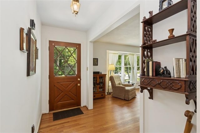 5407 W 64th Ter, Prairie Village, KS 66208 - foyer featuring light wood-type flooring and healthy amount of natural light