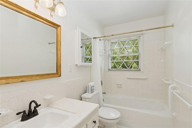 5407 W 64th Ter, Prairie Village, KS 66208 - bathroom with vanity, shower / tub combo with curtain, toilet, and tile walls
