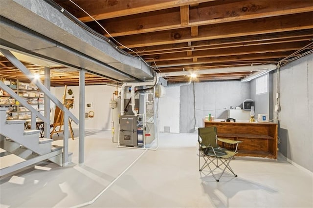 5407 W 64th Ter, Prairie Village, KS 66208 - below grade area featuring heating unit and stairs