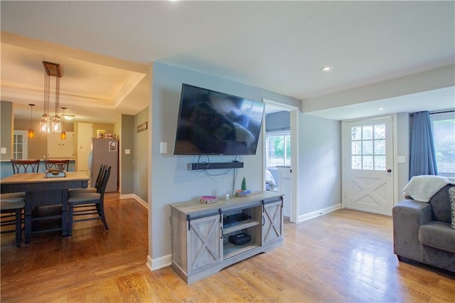 7610 NE Bacon Rd, Cameron, MO 64429 - living area with baseboards, light wood-style flooring, healthy amount of natural light, and recessed lighting